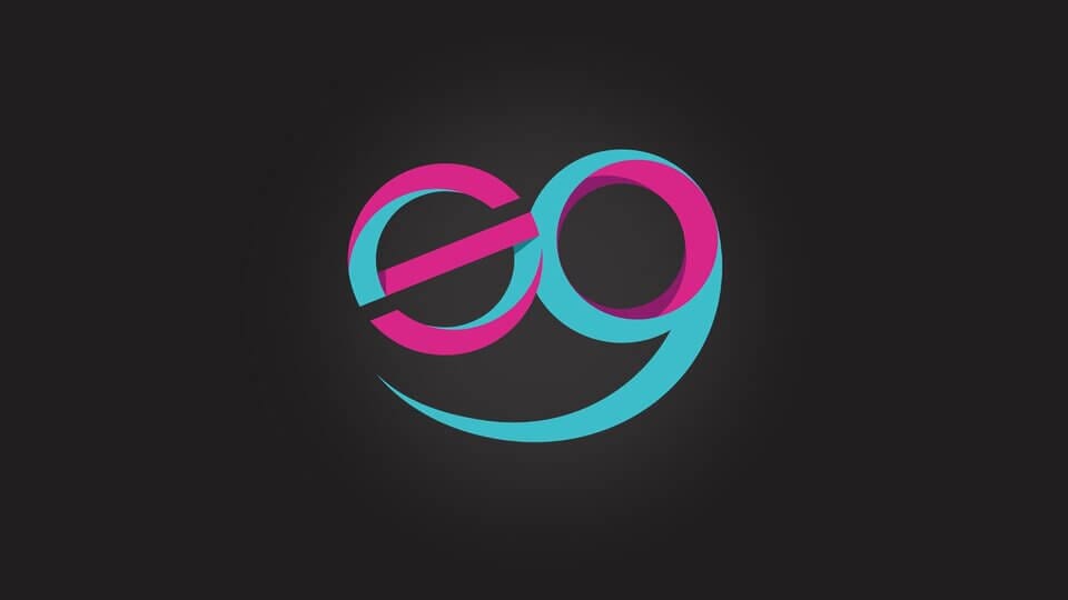 Una "s" minúscula estilizada y entrelazada en rosa y una "g" en azul con una línea curva debajo, una sonrisa,, que evoca el estilo de Marca Soy Guapo.